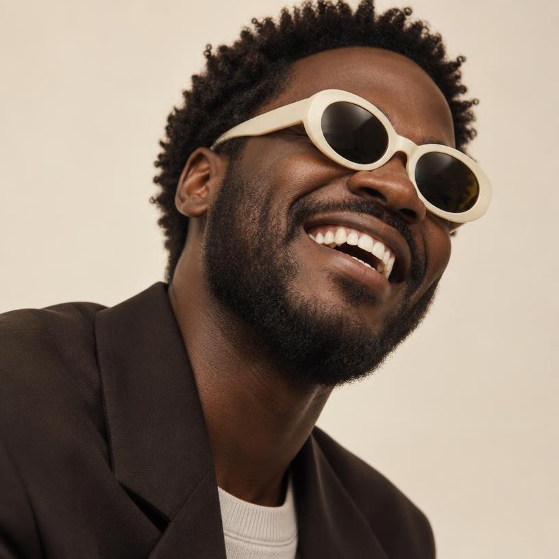 Patient smiling in sunglasses